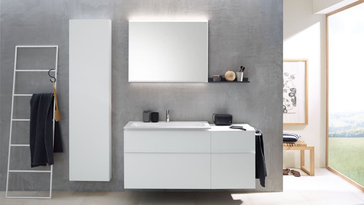 Modern bathroom with wall-hung vanity and mirror